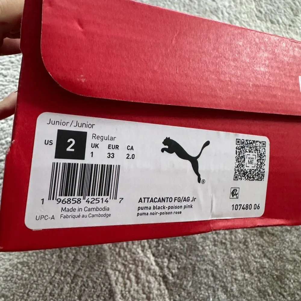 Puma Black and Pink Athletic Cleats